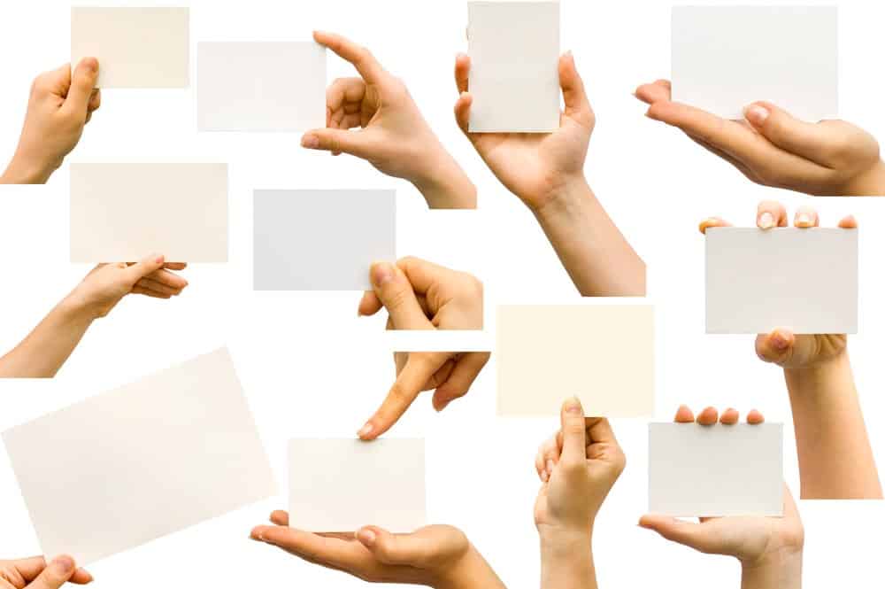 These cards have been in existence since the 1970s. Hand Holding A Business Card 10 Free Photo Mockups